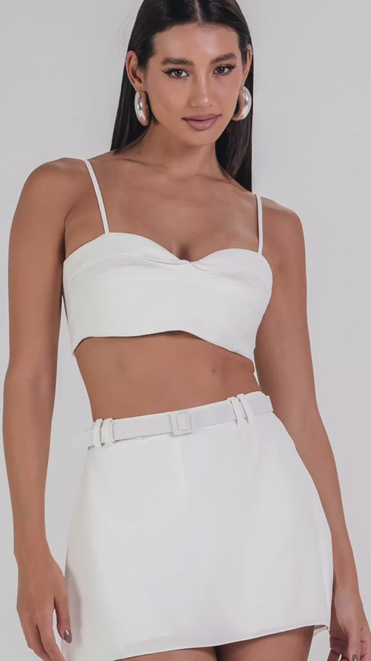 White cropped spaghetti strap top with matching mini skirt (sold seperately)
